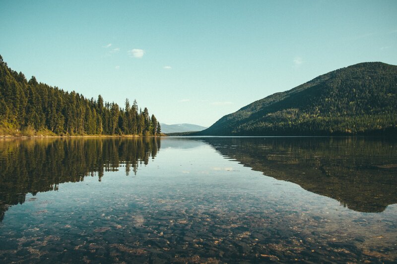 Calm Lake with Forest — Blue, Serene, Afternoon, Photograph, Trees, Mountain