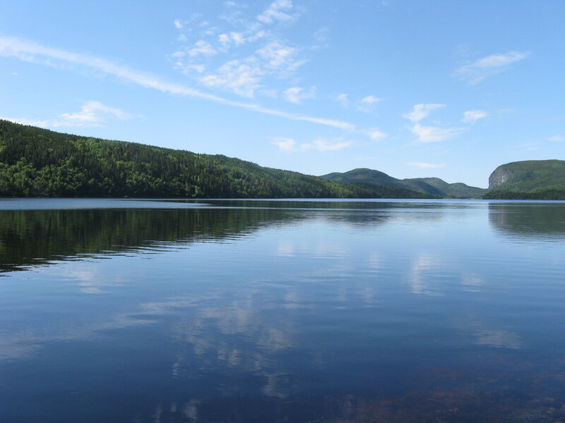 Calm Lake with Forested Hills — Blue