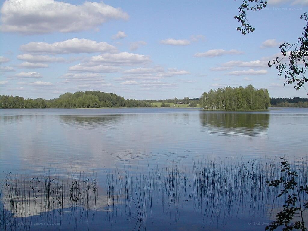 Calm lake with forested islands