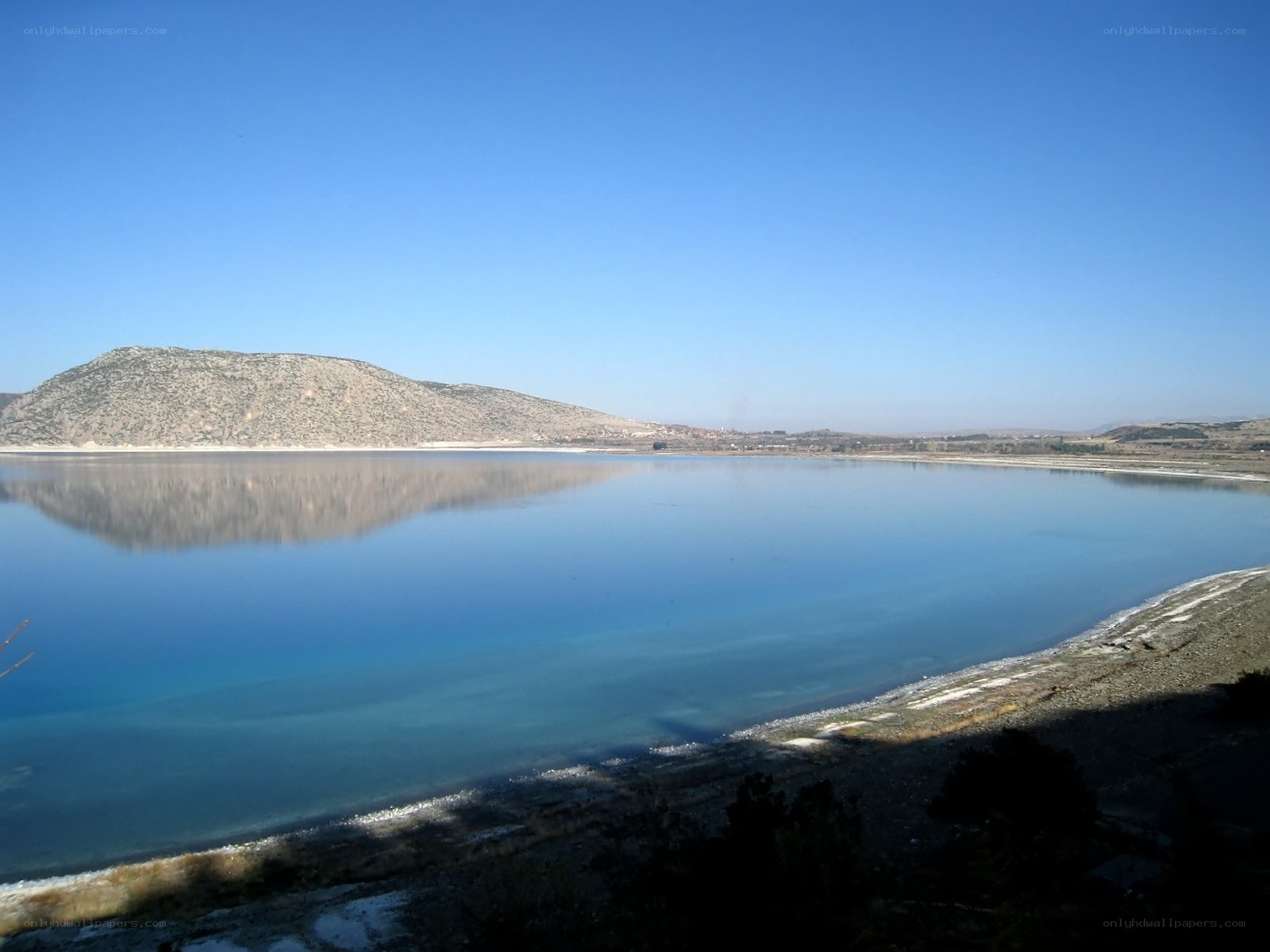calm lake with mountain reflection