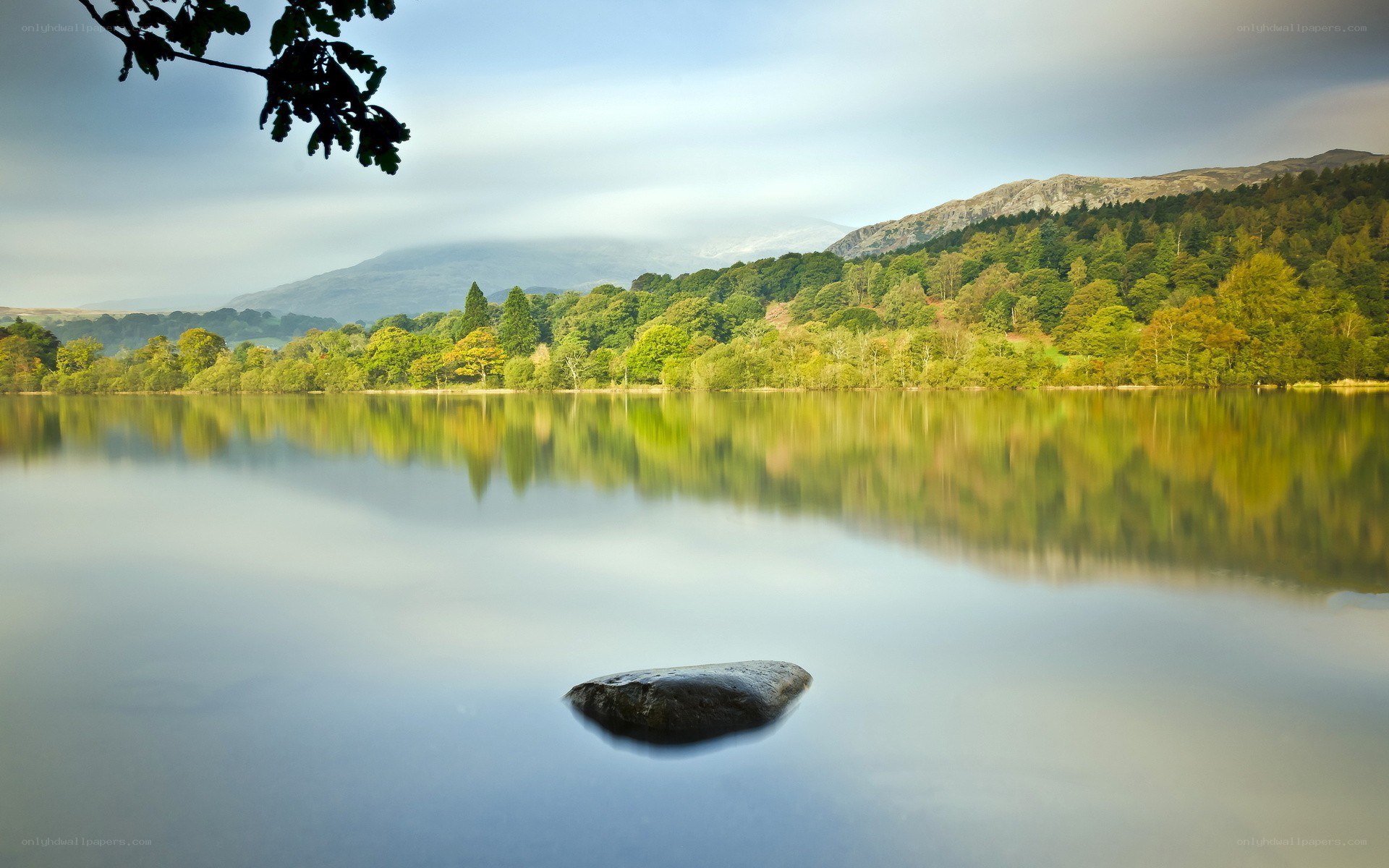 Calm lake with mountain reflection