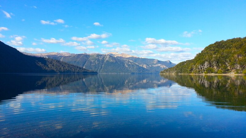 calm lake with mountain reflection