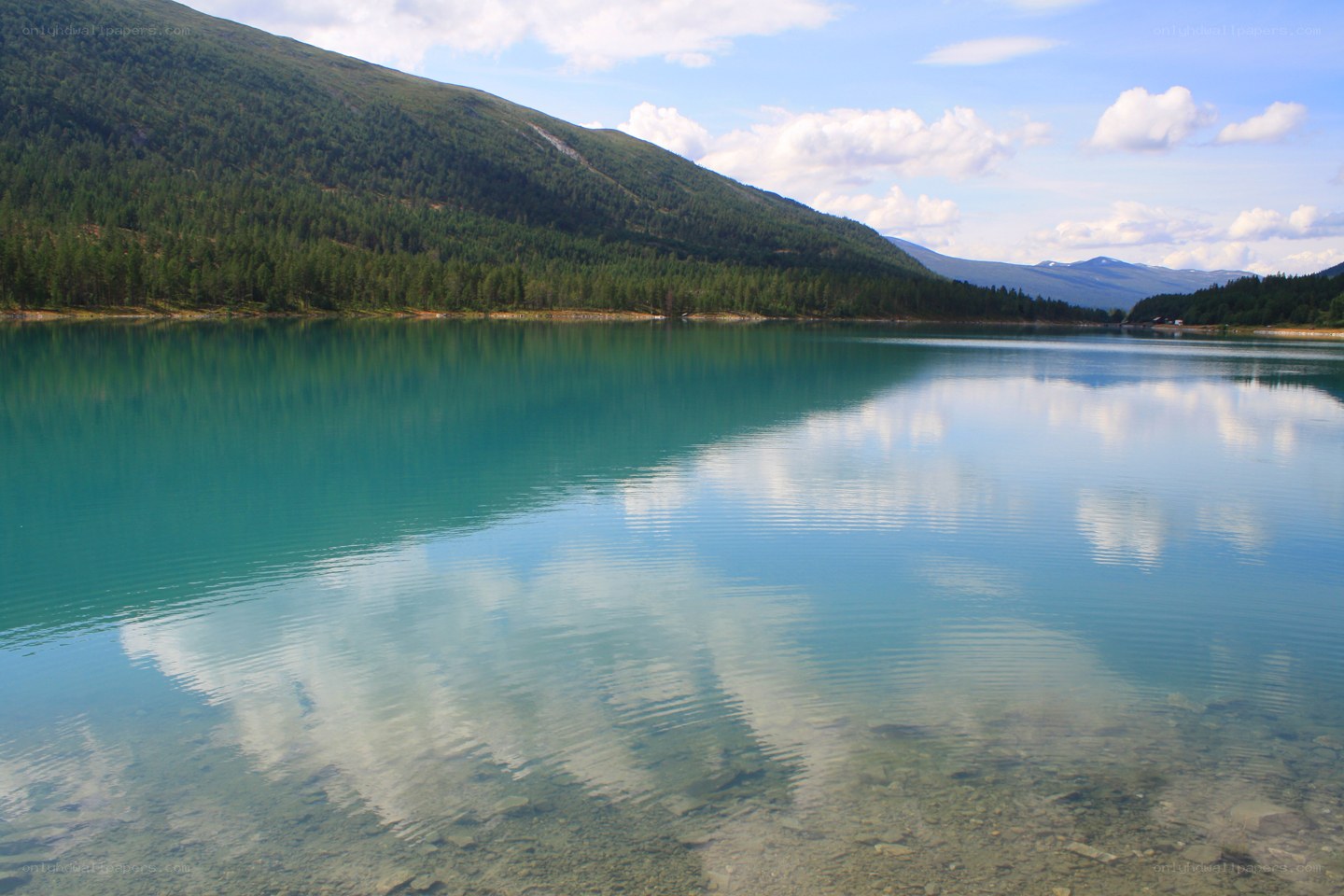 Calm lake with mountain reflection