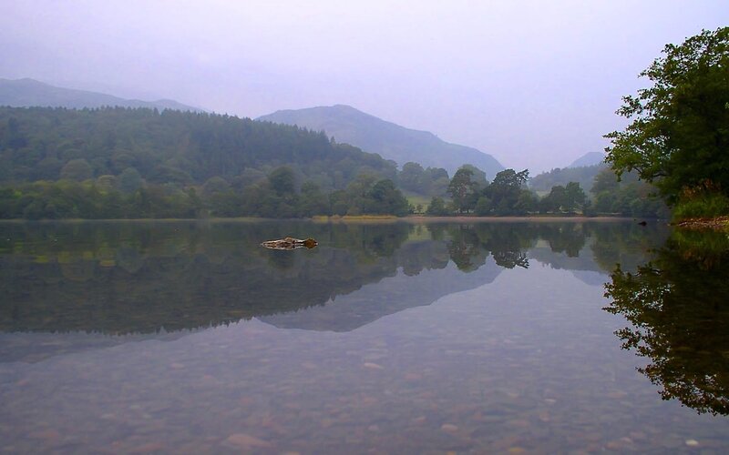 calm lake with mountain reflection