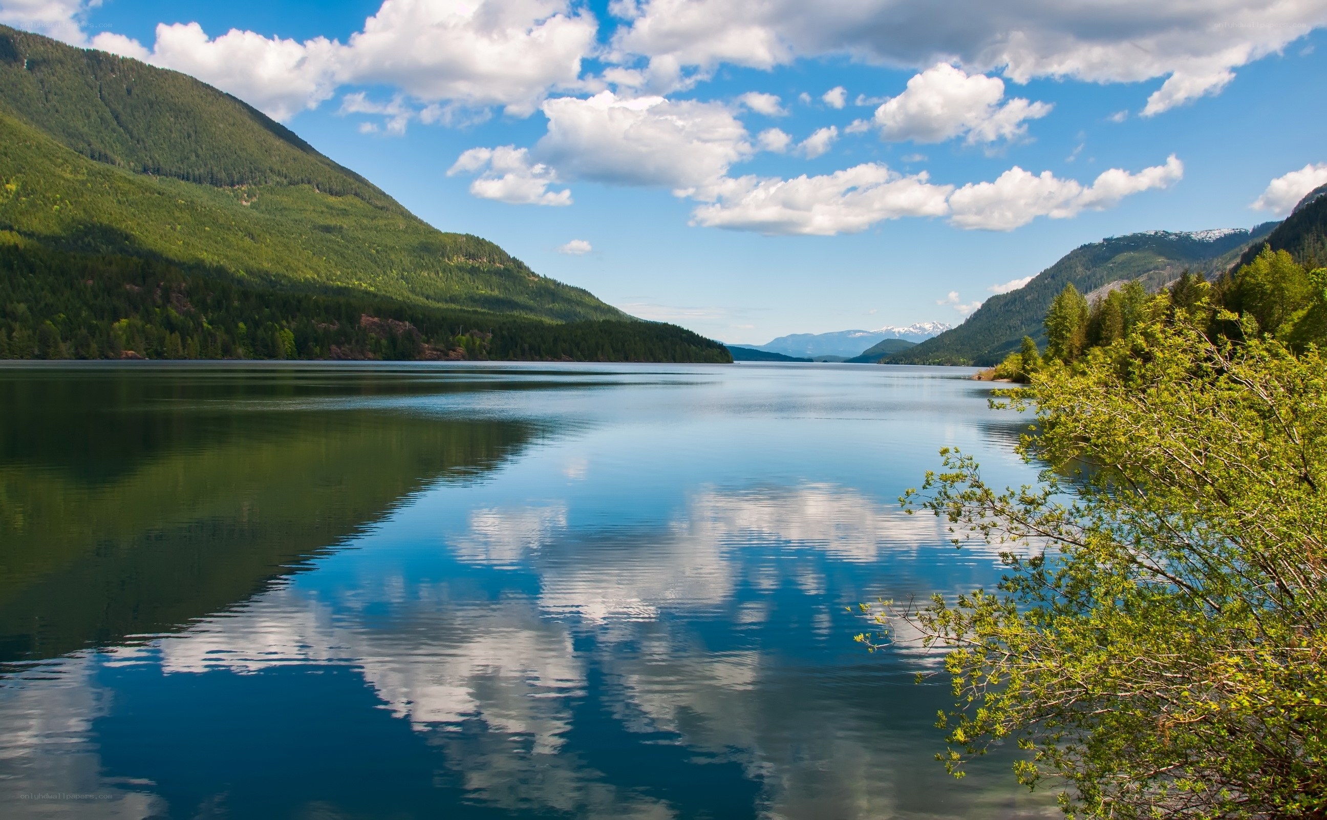 Calm lake with mountain reflections