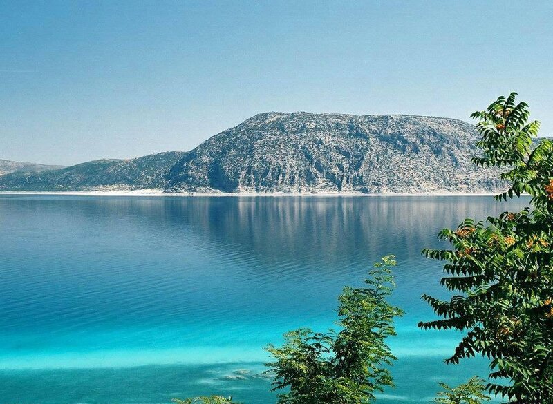 Calm lake with mountain view