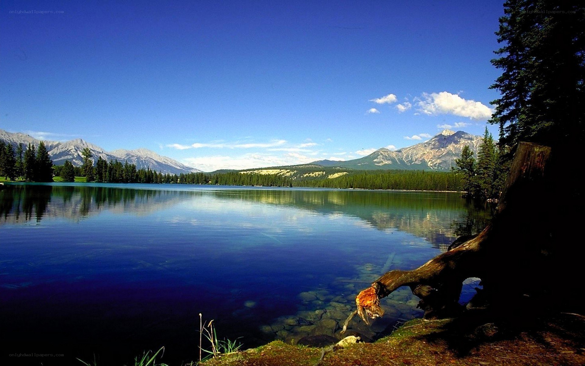 Calm lake with mountain views