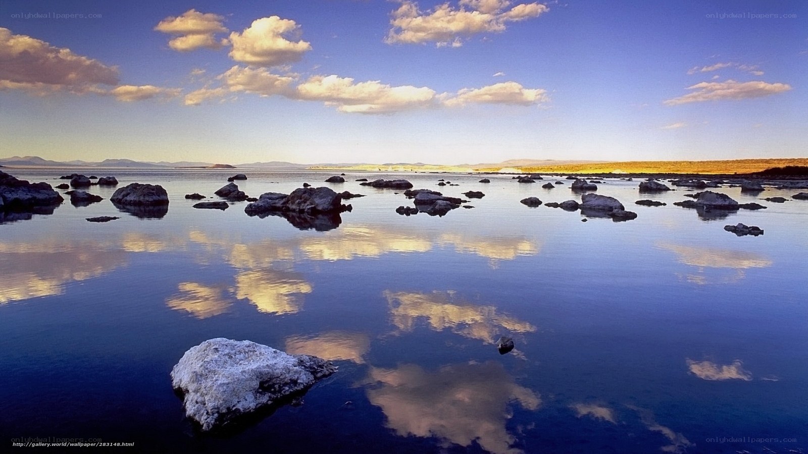 calm lake with rock formations