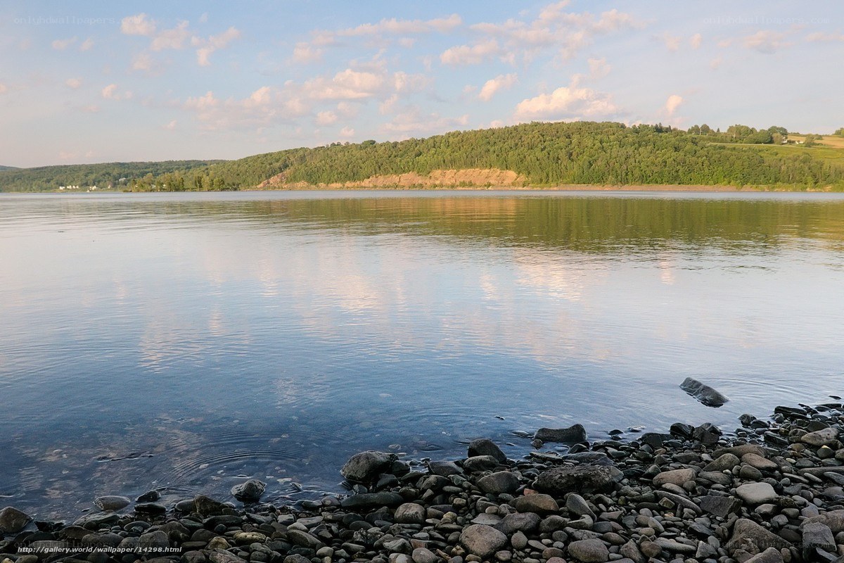 Calm lake with rocky shore