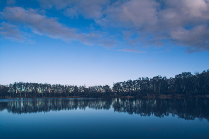Calm Lake with Trees — Blue, Serene, Sunset, Photograph, Sky, Reflection
