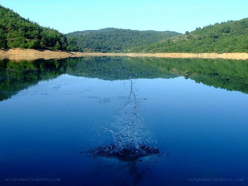 calm lake with water splash