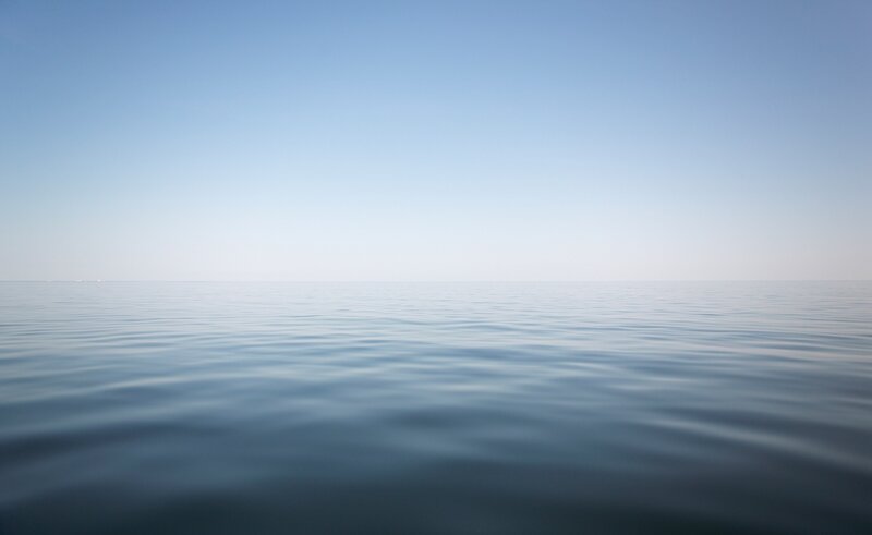 Calm Ocean Surface — Blue, Serene, Morning