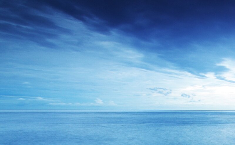 calm ocean under blue sky