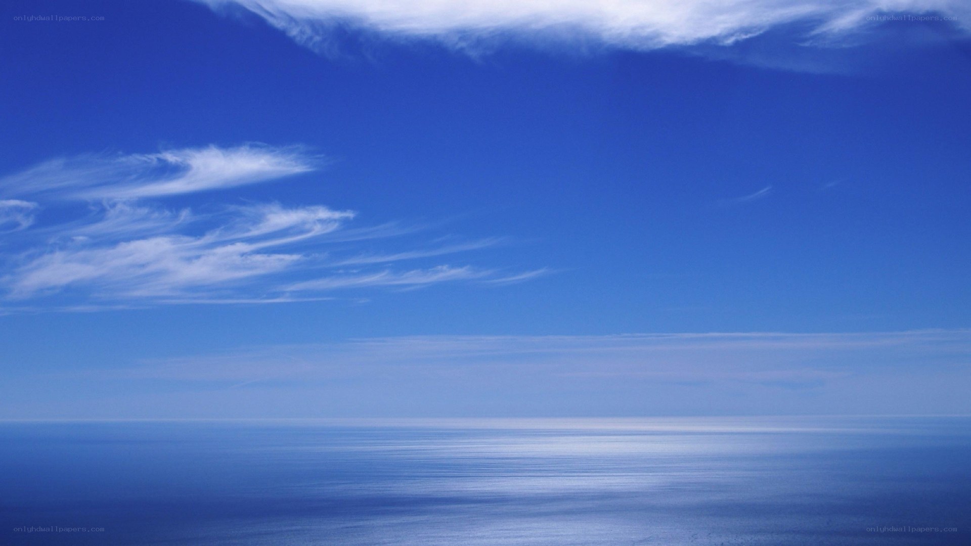calm ocean under blue sky