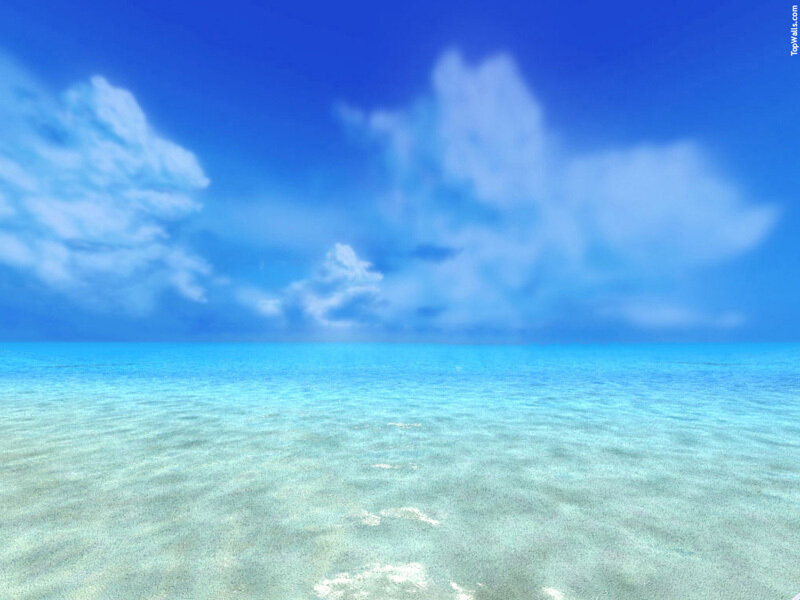 Calm ocean under blue sky