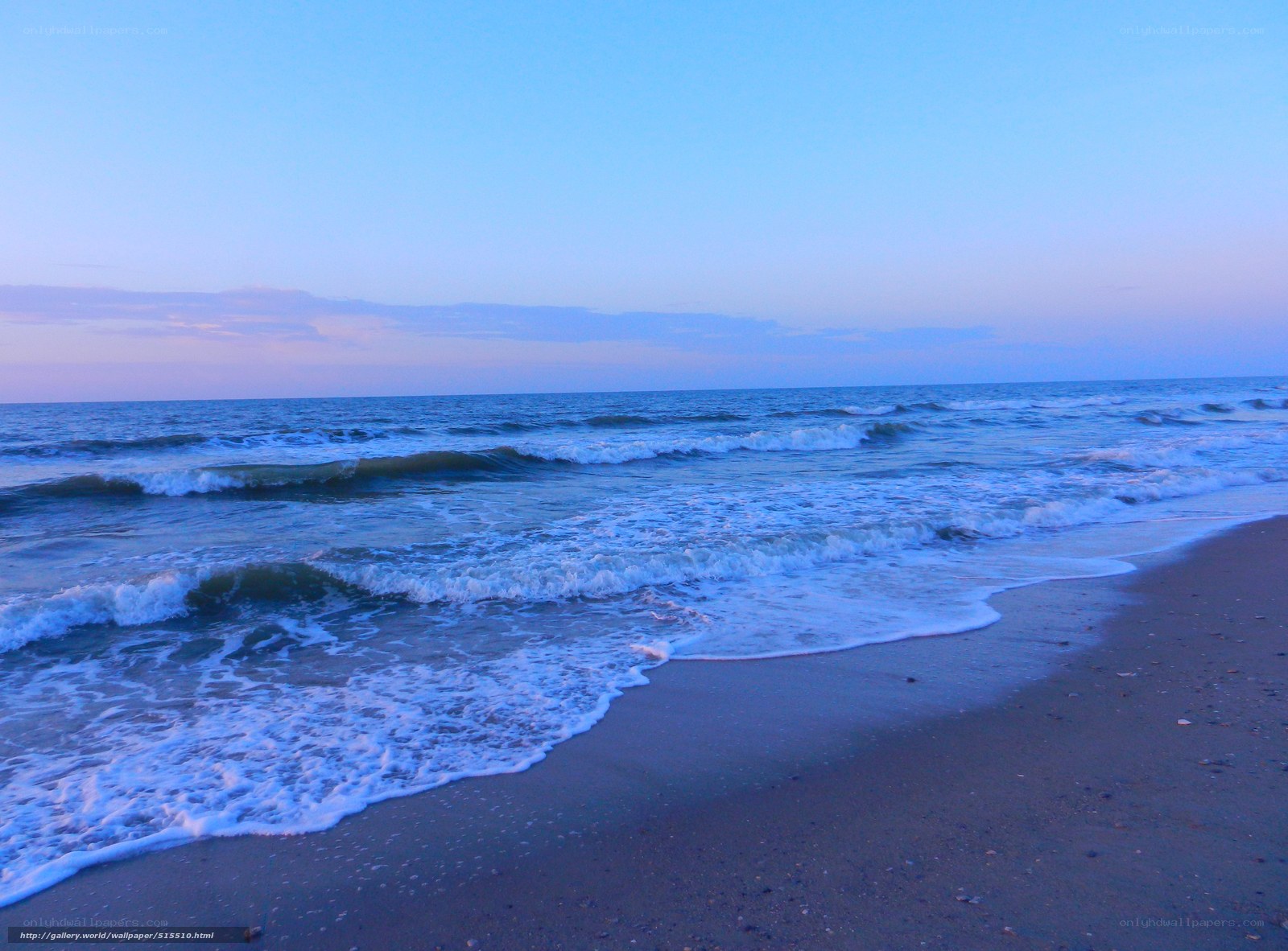 calm ocean waves at dusk