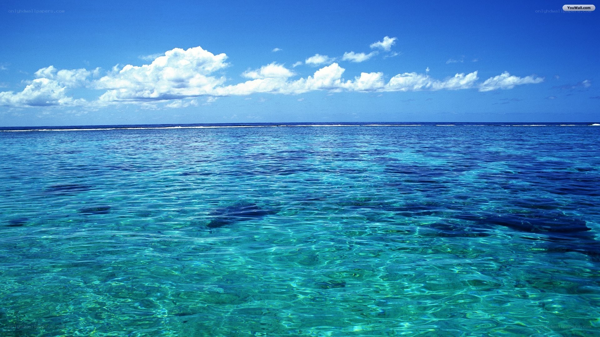 Calm ocean with blue sky