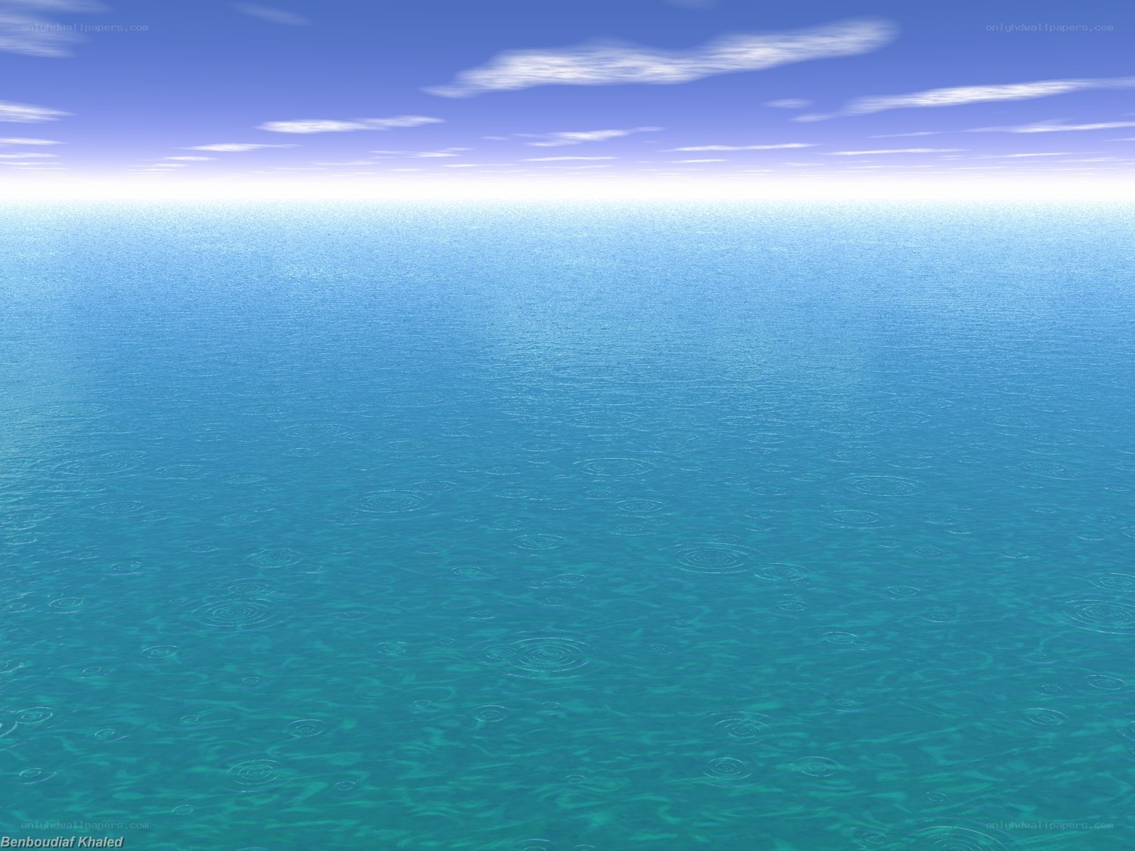 calm ocean with raindrops