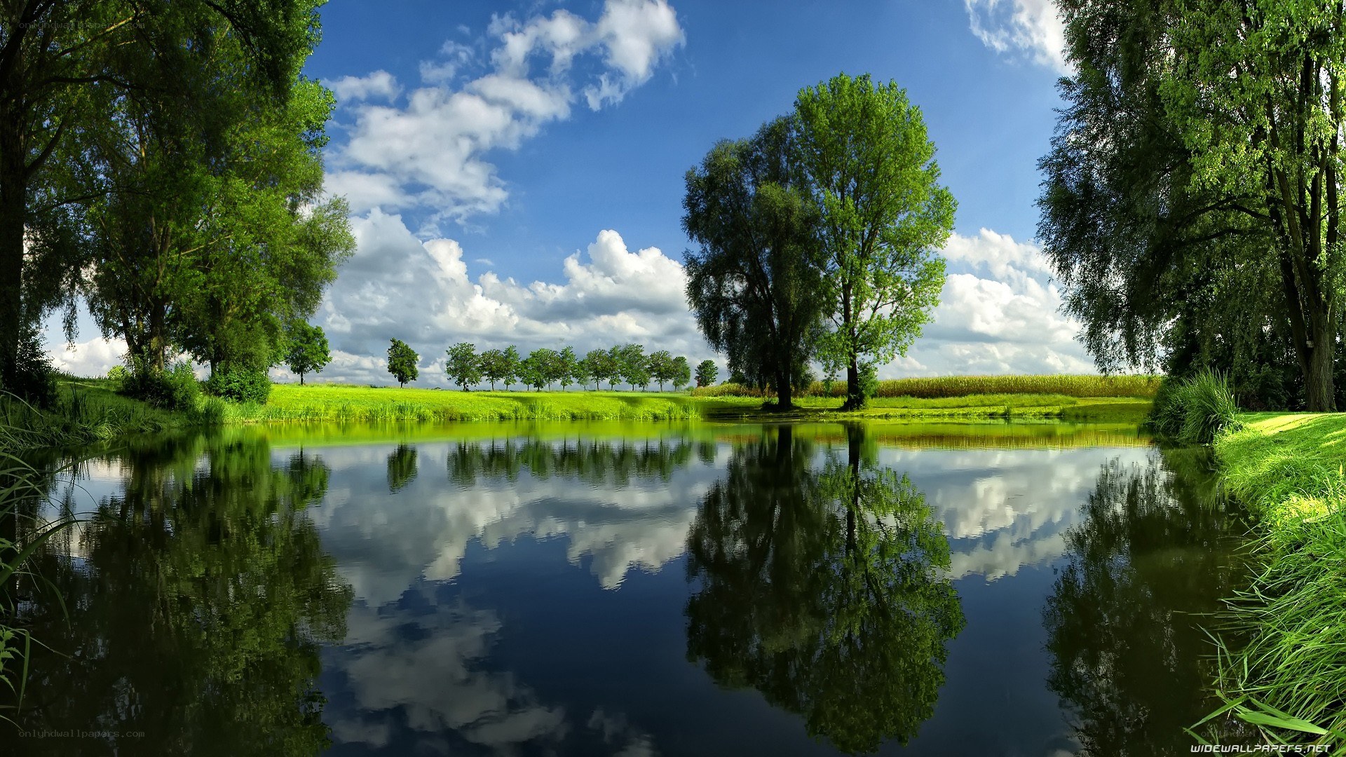 Calm river reflecting sky