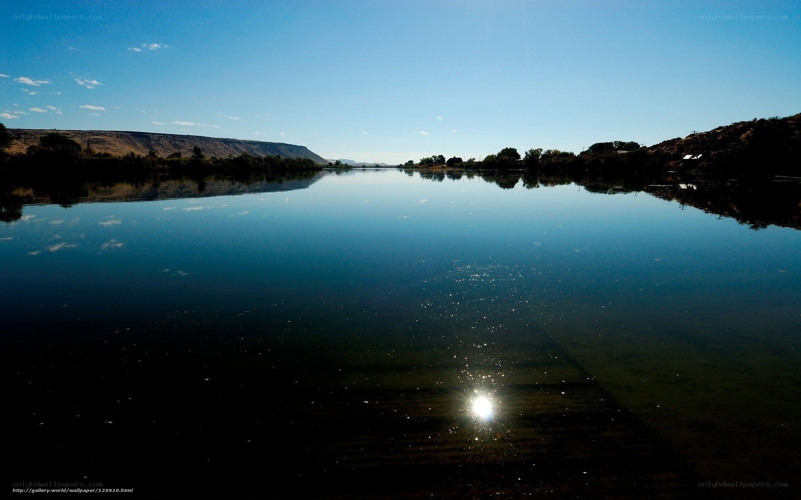 calm river reflecting sky