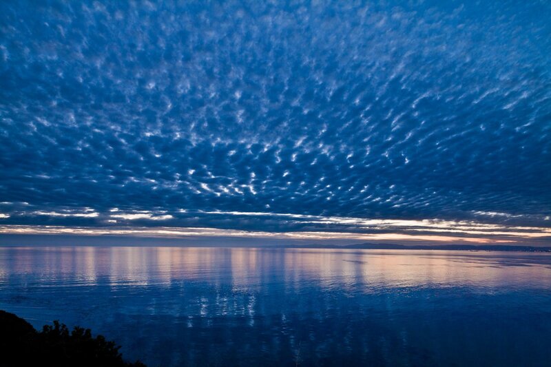 Calm Sea at Dusk — Blue, Serene, Photograph, Clouds