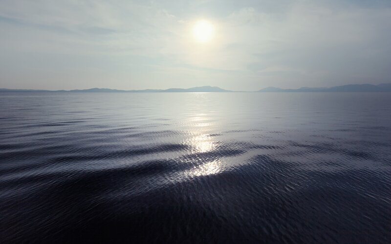 Calm Sea at Sunrise — Blue