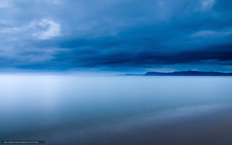 Calm Sea under Cloudy Sky — Blue, Serene, Night, Photograph