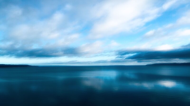 Calm Sea under Cloudy Sky — Blue, Serene, Photograph