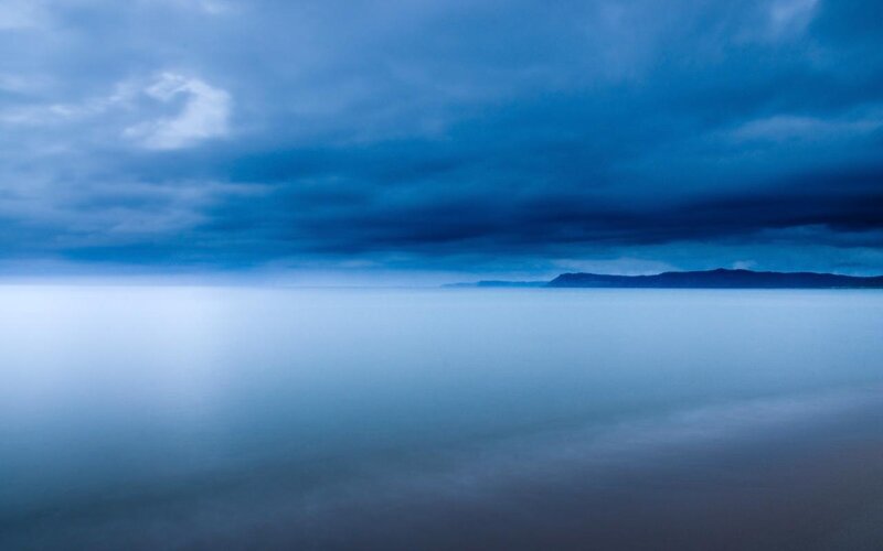 Calm Sea under Cloudy Sky — Blue, Serene