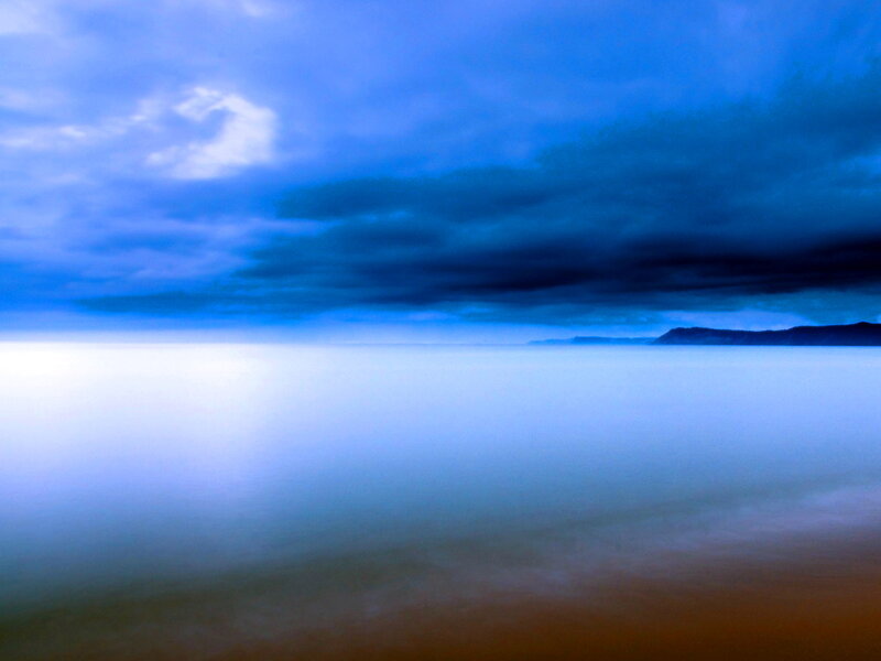 Calm Sea under Cloudy Sky — Blue