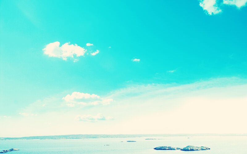 calm sea under turquoise sky