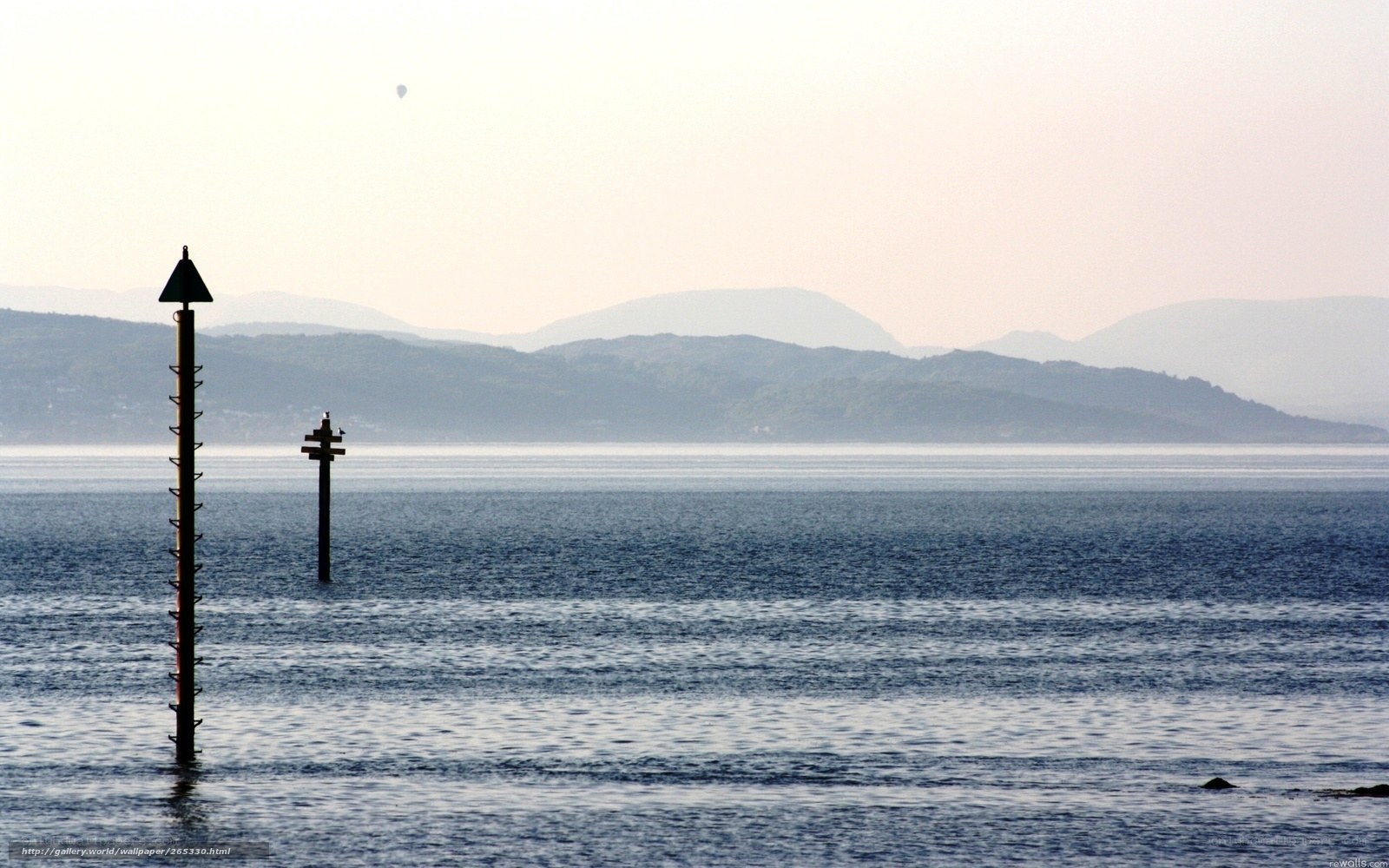 calm sea with buoys