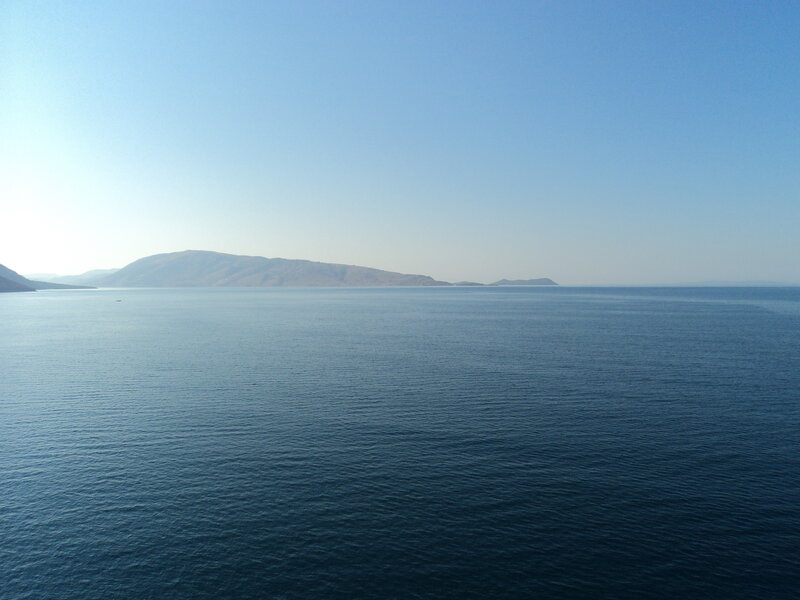 Calm Sea with Distant Islands — Blue