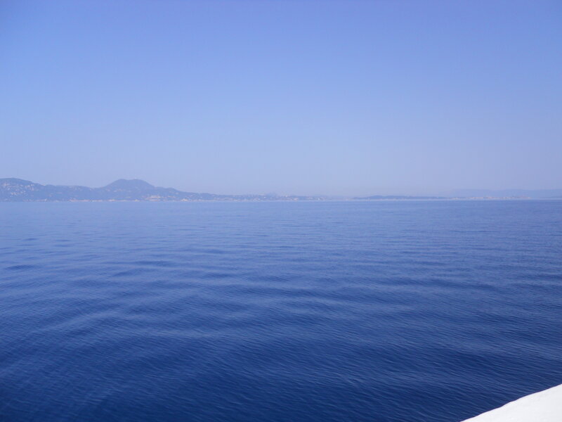 Calm Sea with Distant Land