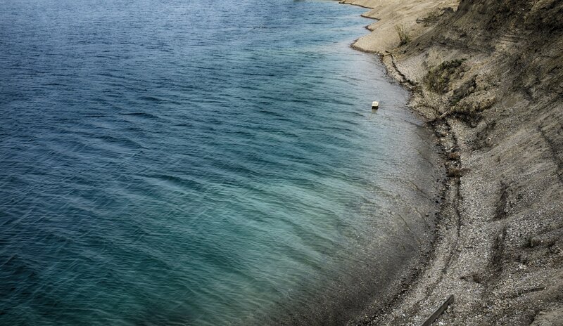 Calm Water and Rocky Shore