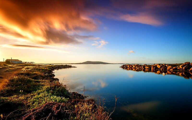 Calm Water at Sunset — Blue, Serene, Photograph, Sky, Clouds, Land