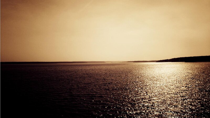 Calm Water at Sunset — Brown, Serene