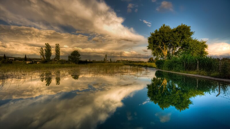 Calm Water Reflecting Sky — Blue, Serene
