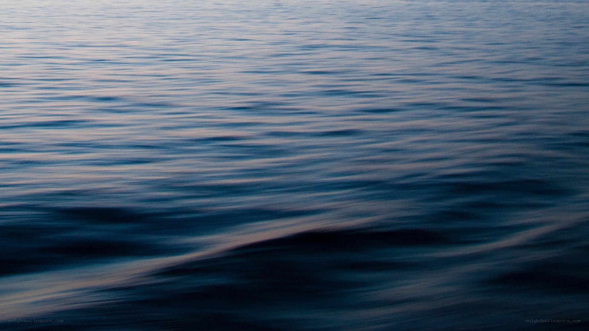 calm water surface at dusk