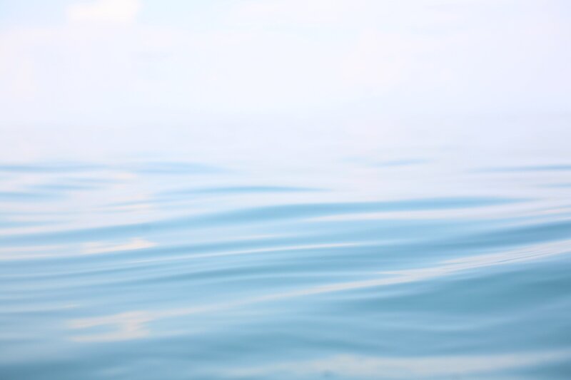 Calm Water Surface — Blue, Serene, Photograph