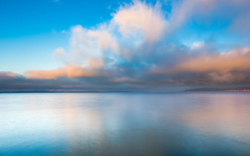 Calm Water under Cloudy Sky — Blue