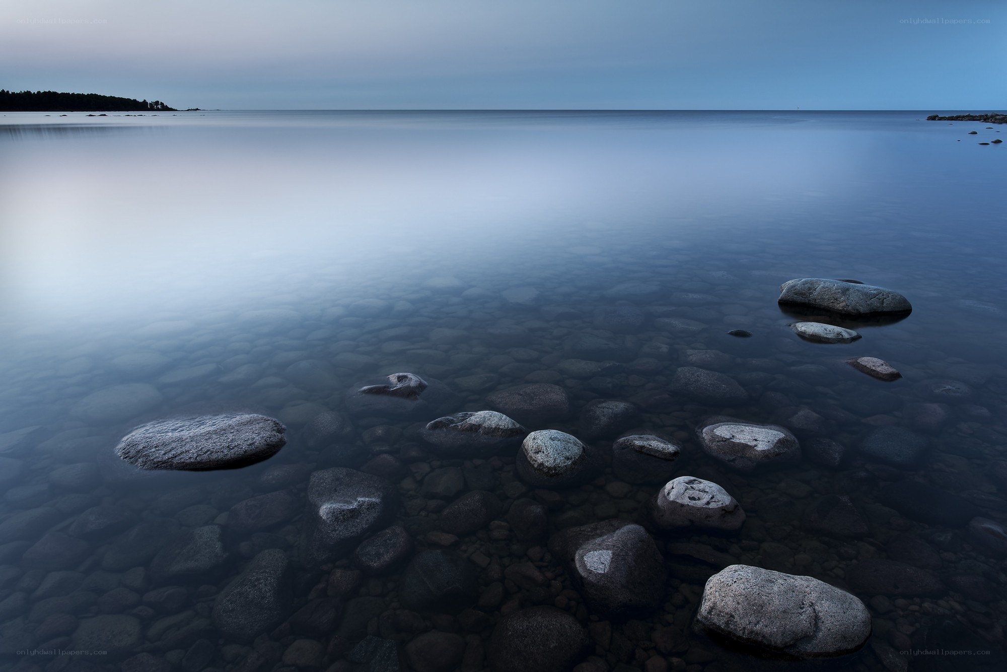 calm waters with rocks