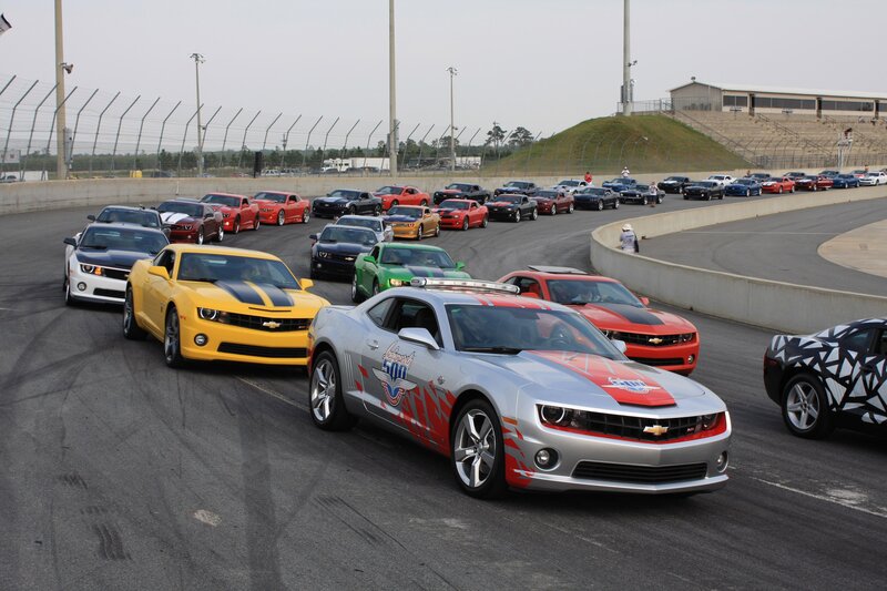 Camaro cars on a racetrack