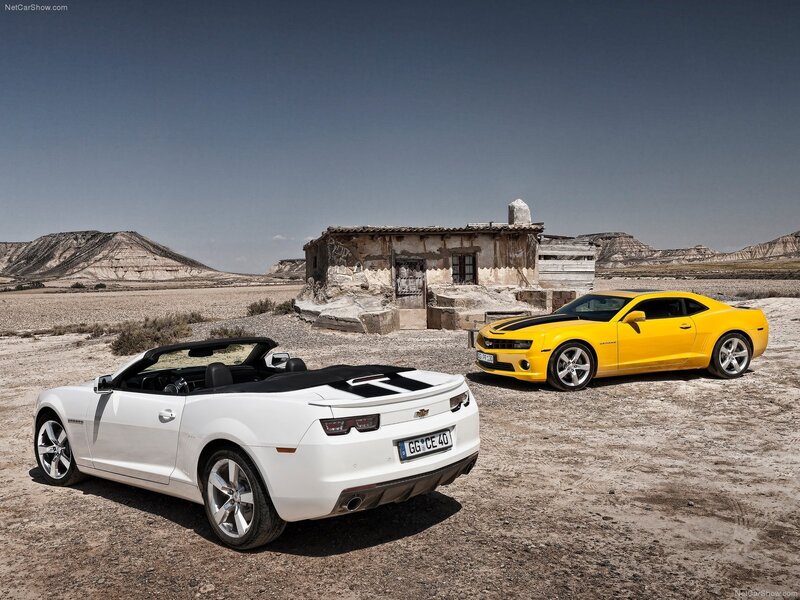 Camaro convertible and coupe in desert