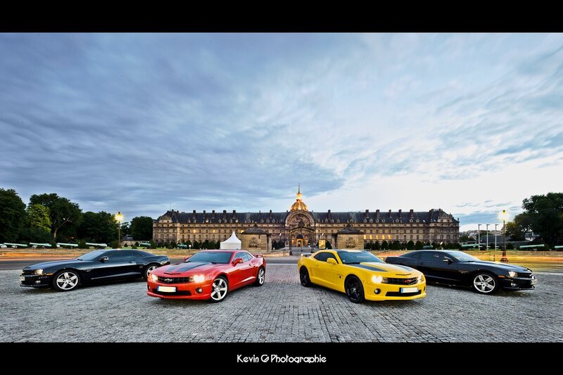 Camaros in front of palace