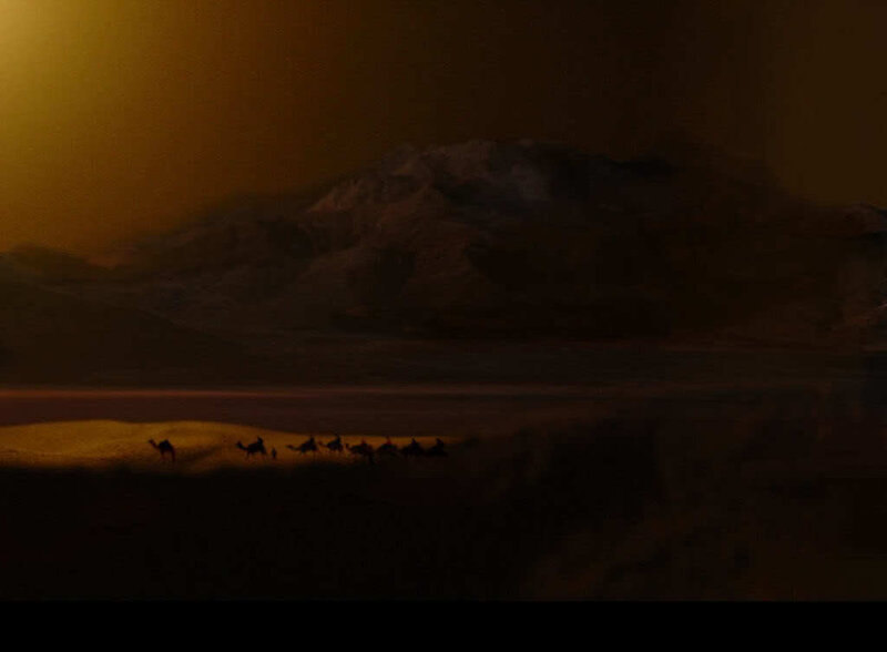 Camel caravan at dusk