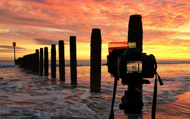 Camera at sunset on pier