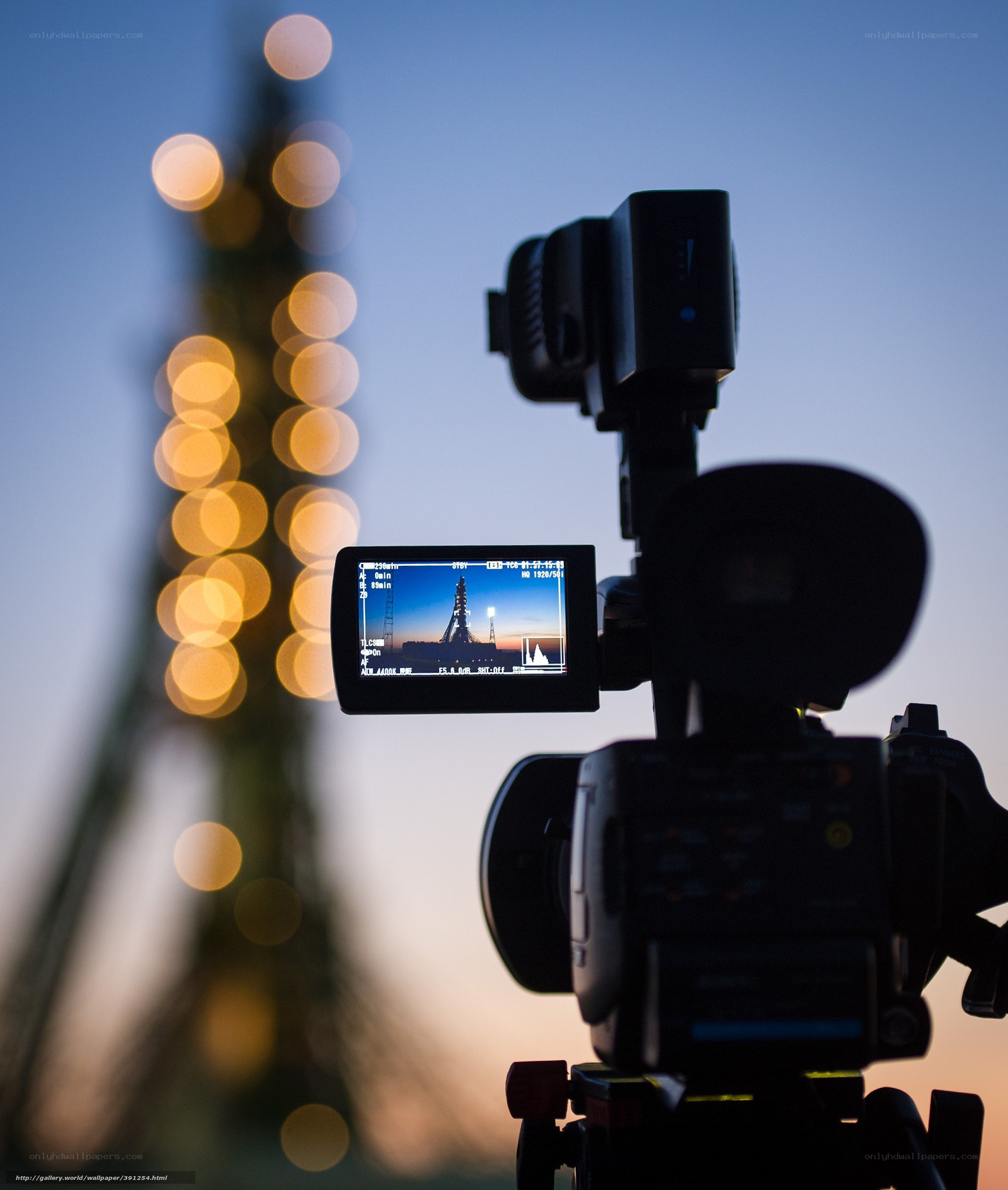Camera filming Eiffel Tower