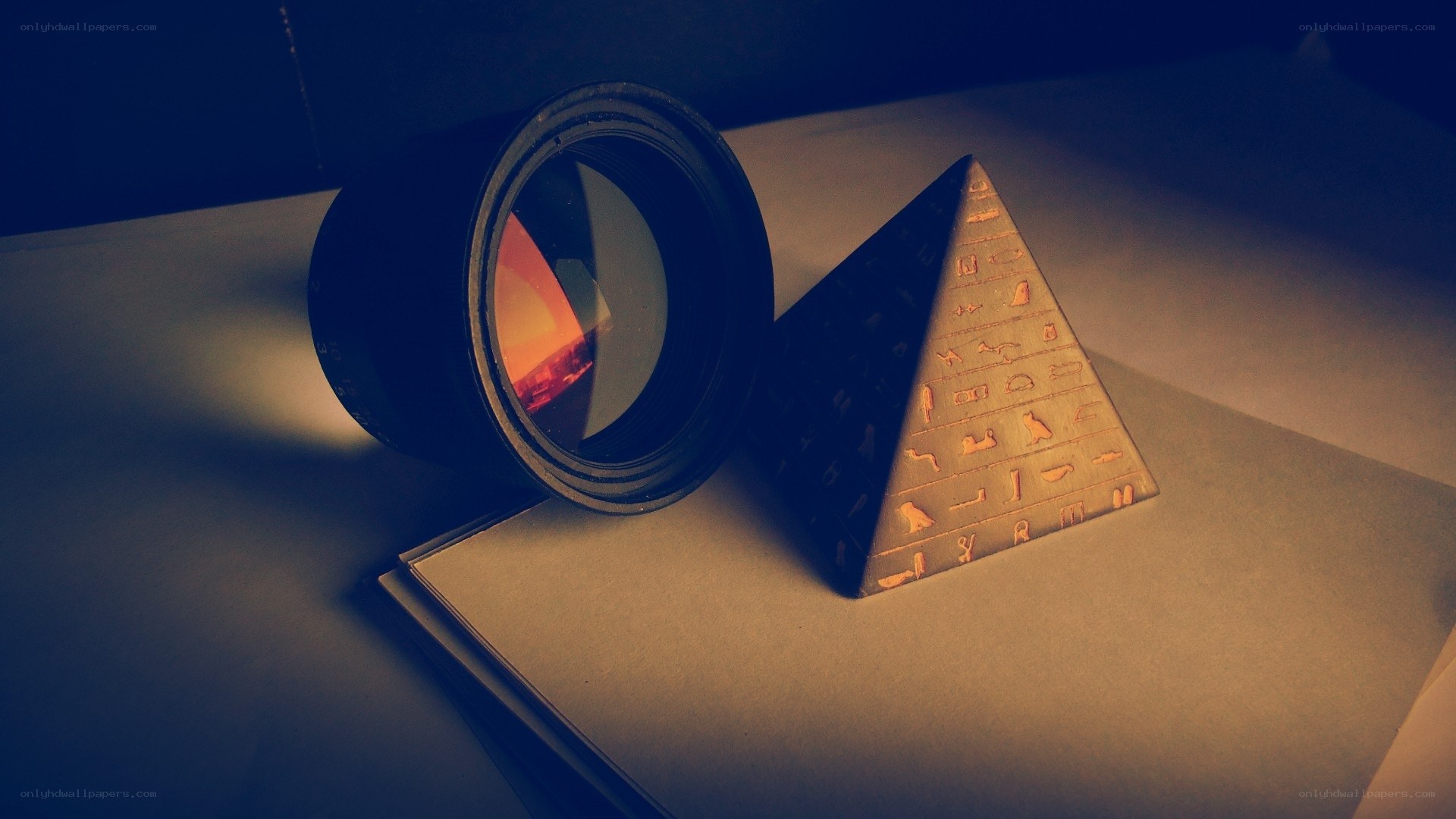 camera lens and pyramid model