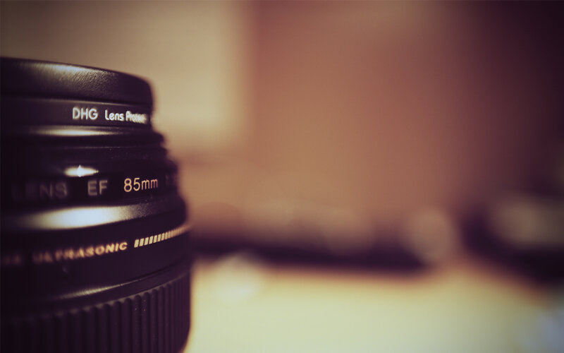 Camera Lens on Table — Brown